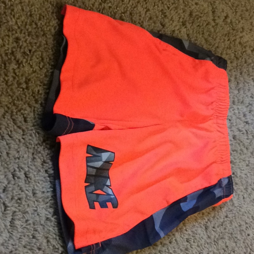 Neon orange Nike shorts